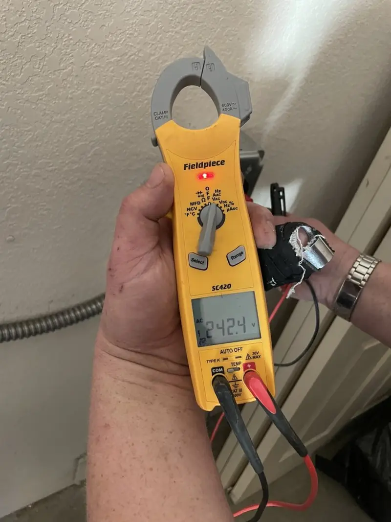 Voltage testing with clamp meter during Aluminum Wiring Replacement in Bowne